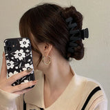 Elegant Black Geometric Hair Claw for Women
